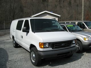 2004 E350 Extended Cargo Van Work Van With Shelving And Cages photo