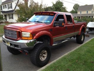 1999 F - 350 Duty,  Lifted,  Crew Cab,  Long Bed photo