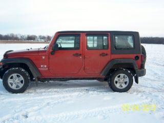 2009 Jeep Wrangler Unlimited X Sport Utility 4 - Door 3.  8l Right Hand Drive photo