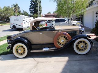 Ford 1930 Mdl A Deluxe Roadster Six Wheel photo