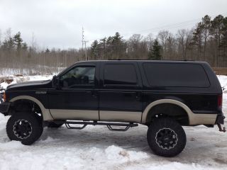2000 Ford Excursion Lifted,  Custom Bumpers photo