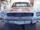 1965 Ford Mustang Orange And White / Black Rims / Fuel Injected Mustang photo 1
