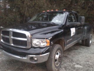 2003 Black Dodge Ram 3500 Duallie With Loader Package Deal photo