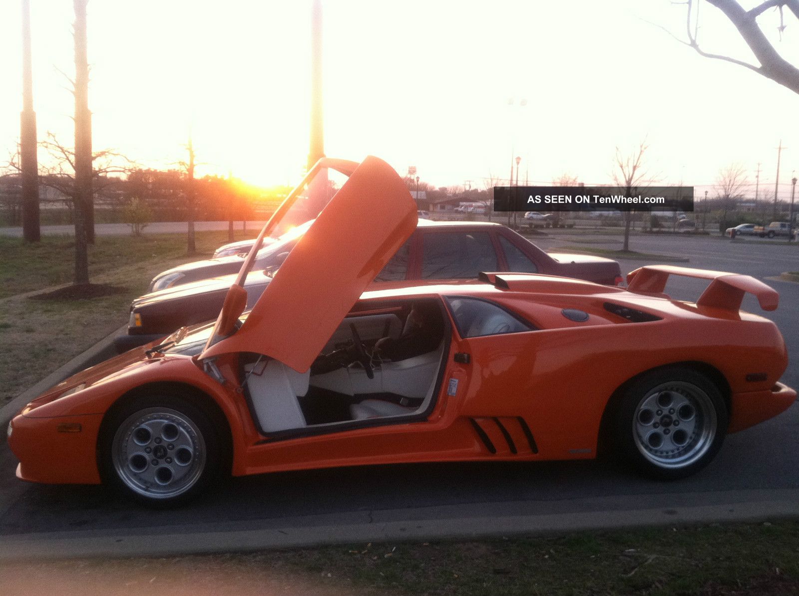2001 Lamborghini Diablo Orange With White Interior.