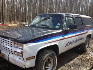 1982 Suburban 4x4.  With Western Power Angle Plow photo