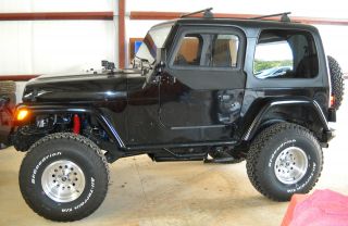 1998 Jeep Wrangler Total Off Frame Restoration With Suspension Lift photo