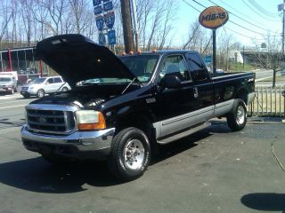 1999 Ford F350 Truck Crew Cab. . .  4x4 Great Work Truck. .  Good Looking. .  No Rust photo