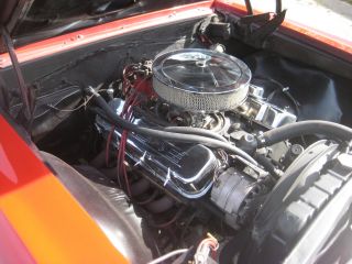 1966 Chevelle.  Big Block Chevy 454,  Slap Shifter,  Red With Black Interior. photo