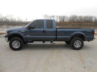 2006 Ford F - 350 Duty Ext.  Cab 6.  0l Lifted Blue 4x4 photo
