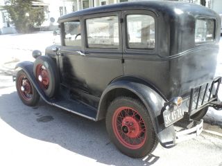Black 1930 Ford Model A Fordor,  Good,  Driveable Condition. photo
