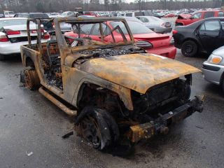2012 Jeep Wrangler Burnt photo
