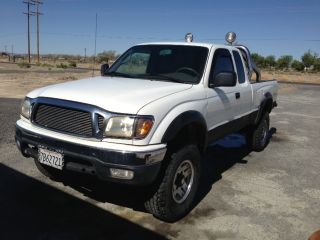 2003 Toyota Tacoma Ext.  Cab Sr5 4x4,  5 Speed,  Dump Bed,  Tires,  Rhino Lined photo