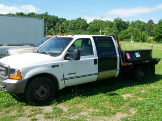 1999 Ford F350 Flatbed Diesel Repo photo
