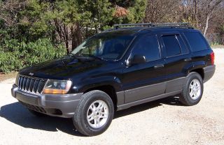 2002 Jeep Grand Cherokee Laredo - V / 8 - Black On Black - In And Out photo