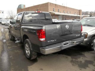 2012 Nissan Titan 4 Door 4x4 Stop Buy And Take A Look At This Deal photo