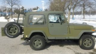 1988 Jeep Wrangler Yj,  6 Cyl,  Condition Fair,  Green Od Paint,  Has Hard Top photo