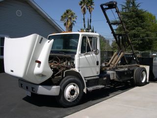 2002 Freightliner Fl70 Truck With Flat And Dumpster Switch N Go Beds photo