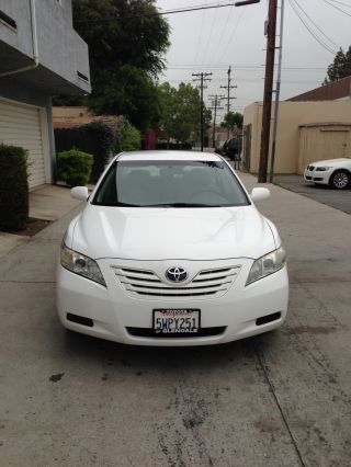 2007 White Toyota Camry Le With Extended Warrantly photo
