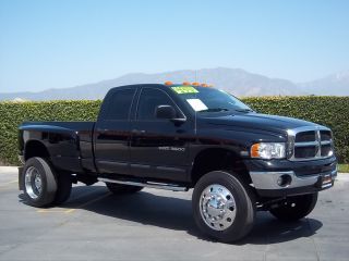 2004 Dodge Ram 3500 4x4 Dually With 22.  5 Semi Wheels And Tires,  Lifted,  Loaded photo