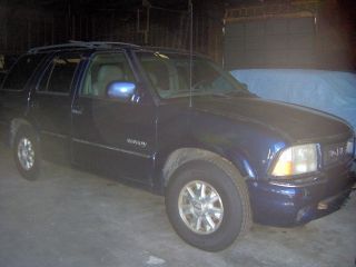 2000 Gmc Envoy. . .  Blown Motor. . .  Body. . .  Clear Title. .  Tires. .  Loaded photo