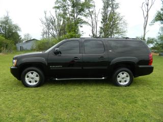 2011 Chevy Suburban Z71,  W / Dvd, ,  Tinted Windows,  And More photo