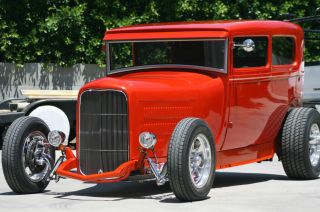 1929 Model A Tudor Hiboy On Pete And Jakes 32 ' Frame.  Metal Work By Marcel photo