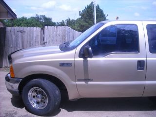 2001 Diesel,  Cowboy Bed,  Chrome Wheels,  Automatic Transmission,  Goose Neck Equip. photo